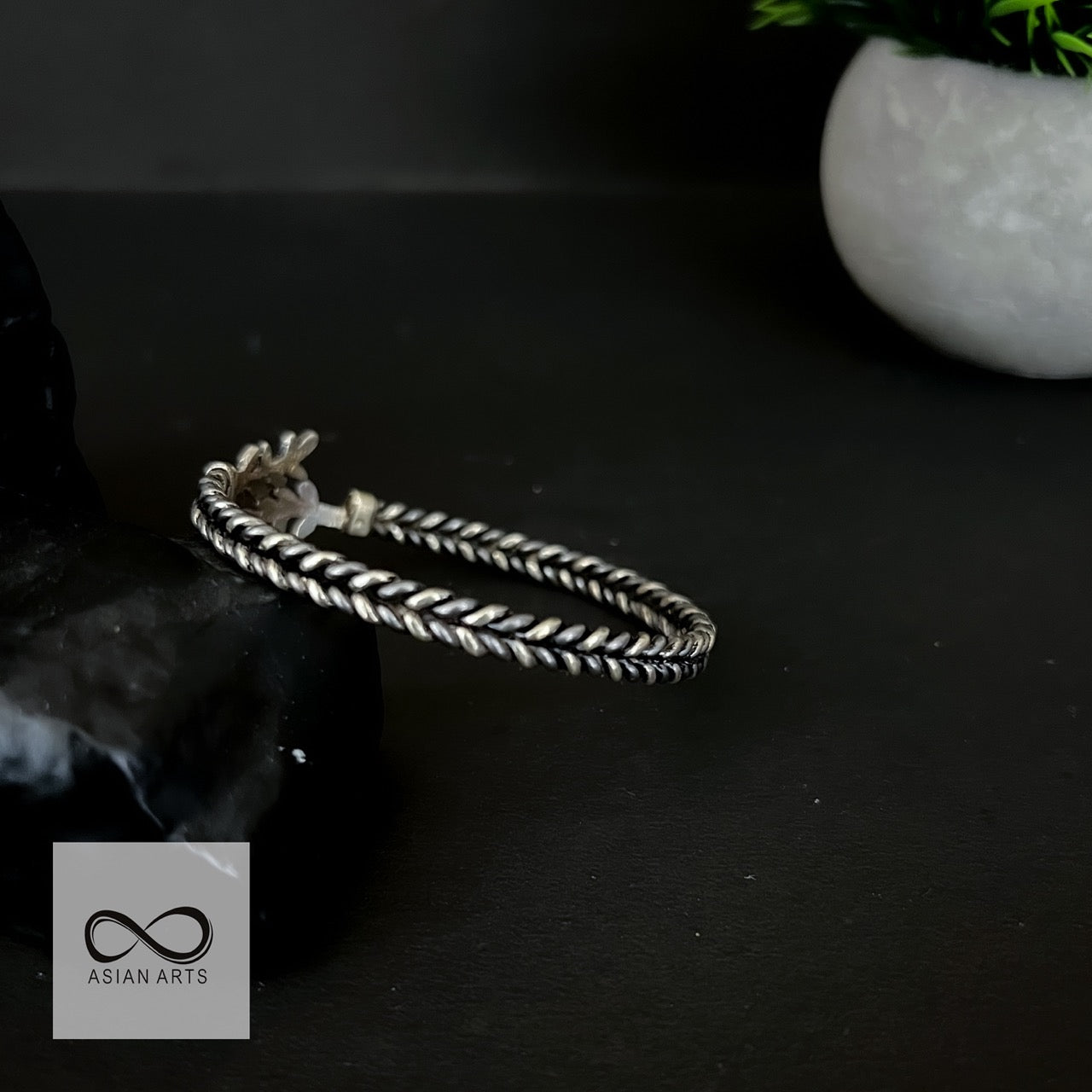 Iron-Silver Two-Line Twisted Leaf design Bangle