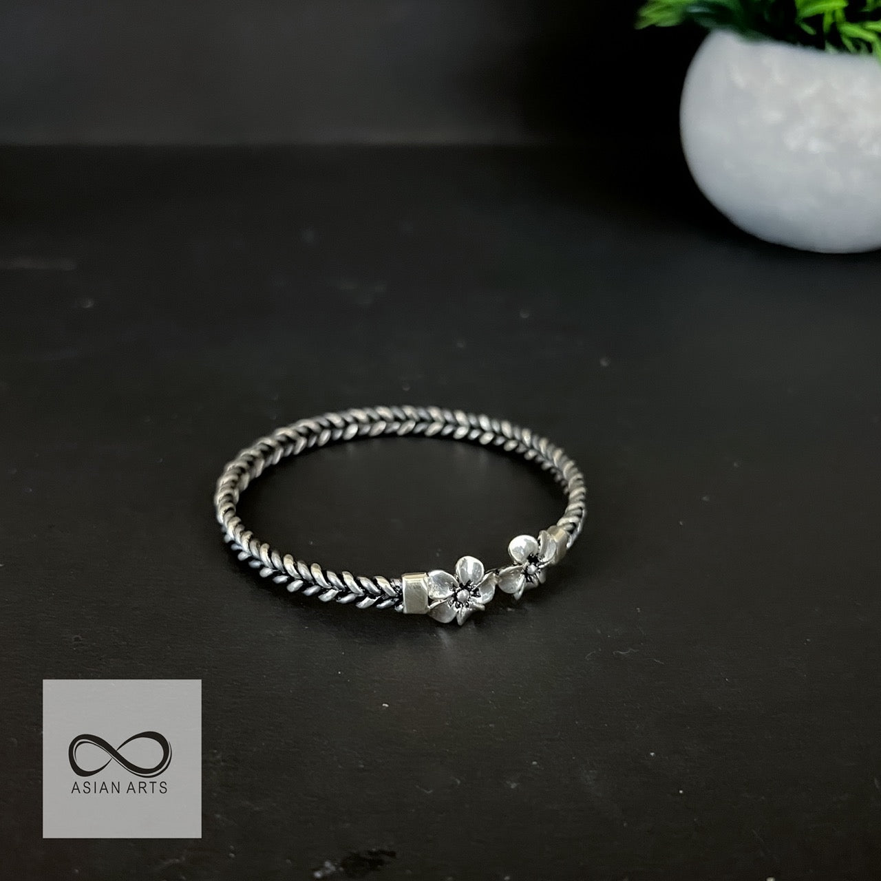 Iron-Silver Two-Line Twisted Casting Flower Design Bangle